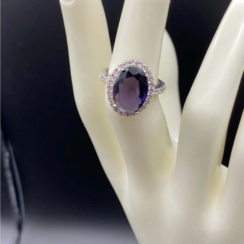 Sterling Silver amethyst prong set cocktail ring with gemstone halo bezel
